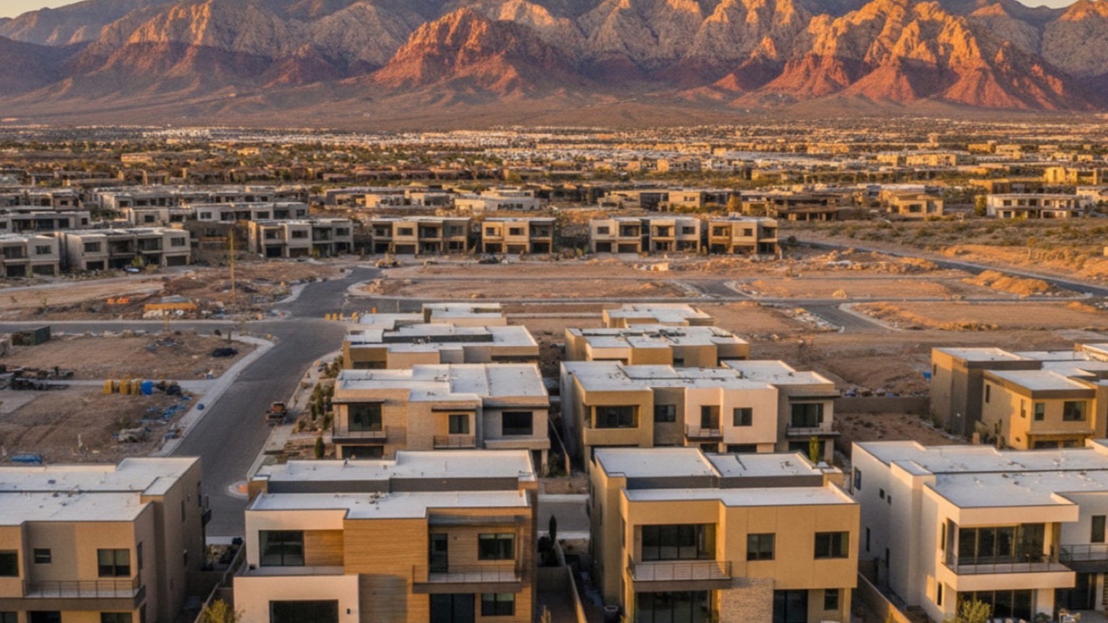 Established Summerlin village streetscape with single-story homes, mature trees, and mountain views in Las Vegas
